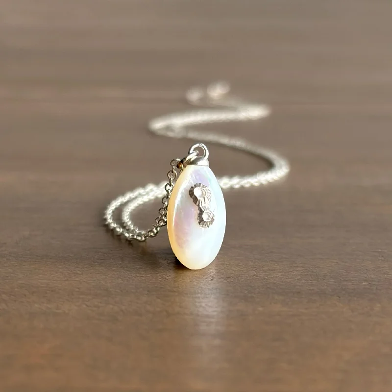 Once-A-Year Jewelry Sale – Grab Your Favorites Now Little Mother of Pearl Necklace with Silver Barnacles Once-A-Year Jewelry Sale – Grab Your Favorites Now Little Mother of Pearl Necklace with Silver Barnacles