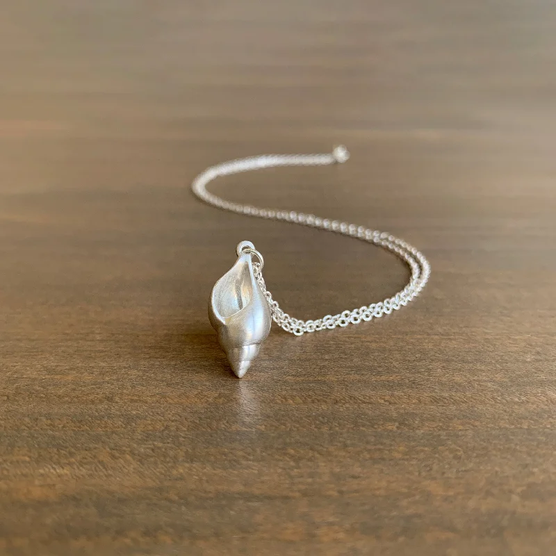 Luxury Handcrafted Jewelry For Elegant Looks Little Silver Tulip Shell Ruthie B. Necklace Luxury Handcrafted Jewelry For Elegant Looks Little Silver Tulip Shell Ruthie B. Necklace