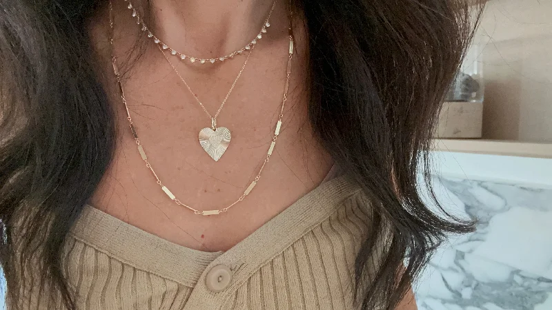 Chic And Stylish Jewelry At Exclusive Prices The Bella Fluted Heart Charm