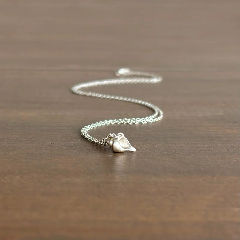 Discover Unique Jewelry With Special Limited-Time Offers Tiny Silver Whelk Shell Ruthie B. Necklace Discover Unique Jewelry With Special Limited-Time Offers Tiny Silver Whelk Shell Ruthie B. Necklace