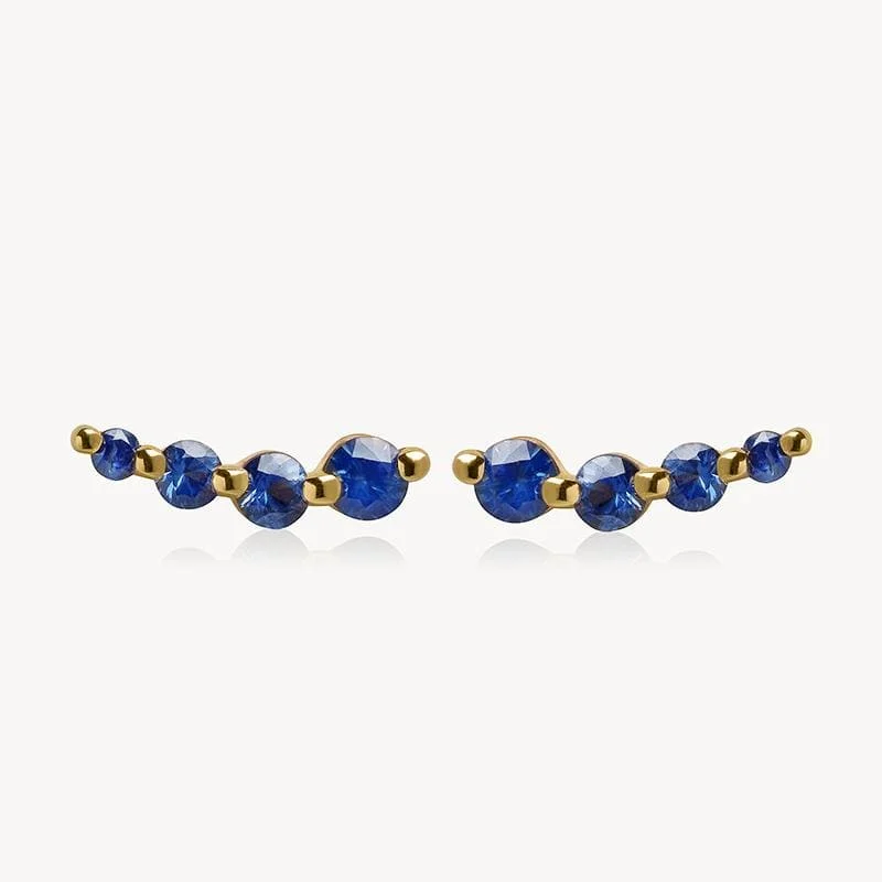 Elevate Your Outfit With Discounted Statement Jewelry Curved Sapphire Studs
