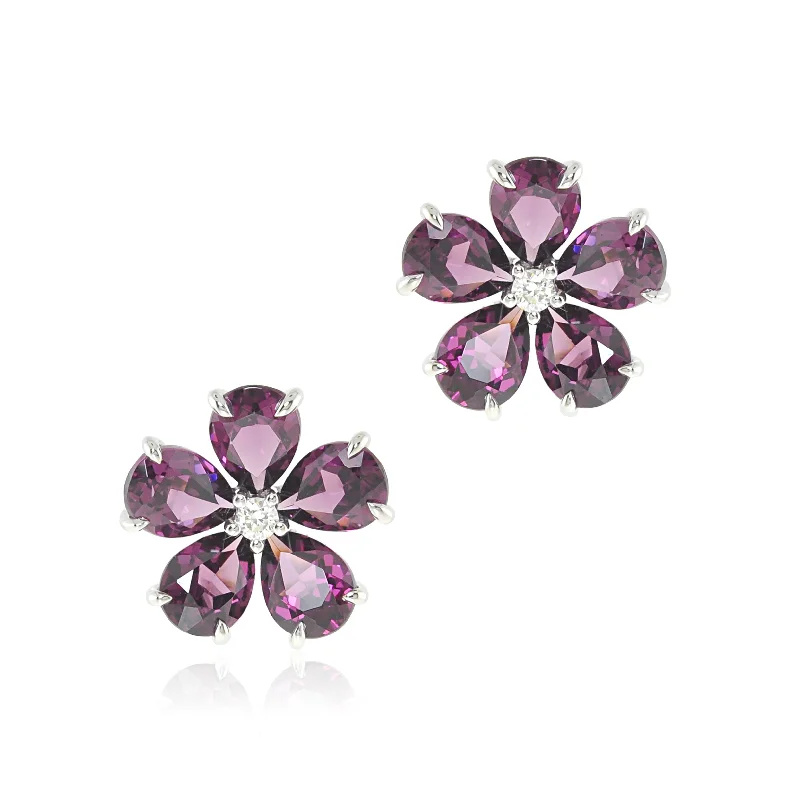 Shop Dazzling Jewelry With Special Promotional Discounts Forget-Me-Not Earrings in Rhodolite Garnet & Diamonds Shop Dazzling Jewelry With Special Promotional Discounts Forget-Me-Not Earrings in Rhodolite Garnet & Diamonds
