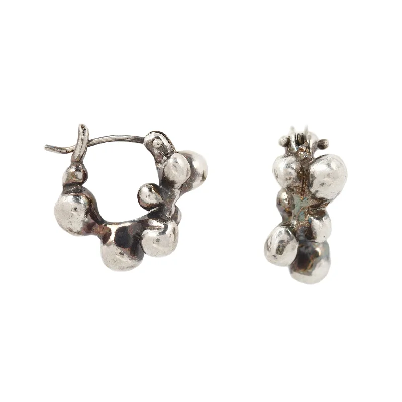 Elevate Your Outfit With Discounted Statement Jewelry Silver Molten Cluster Hoops