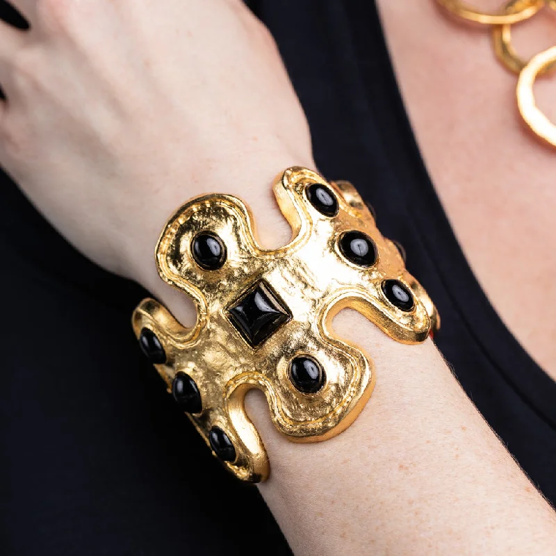 Elevate Your Outfit With Discounted Statement Jewelry Gold and Black Cabochon Cuff