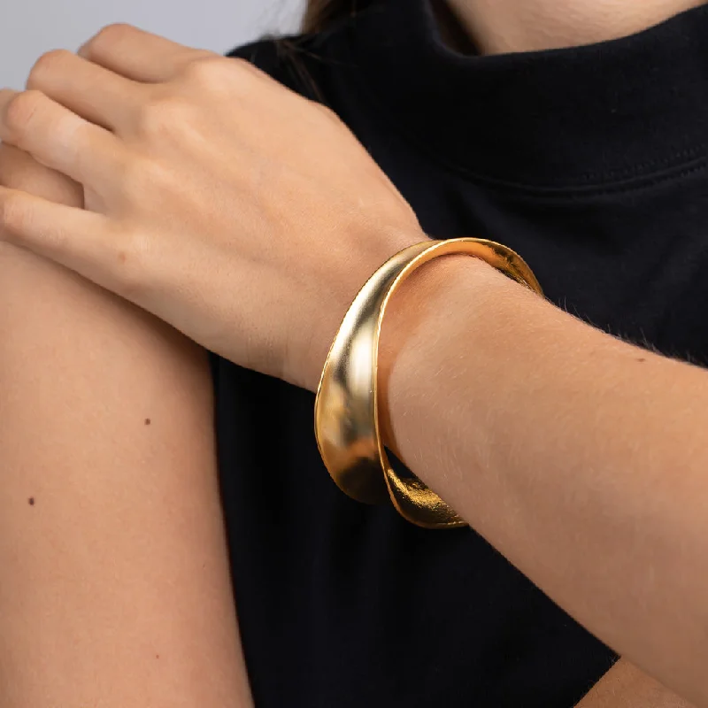 Jewelry Sale Bonanza – Grab Your Sparkle Now Satin Gold Wavy Contoured Bangle
